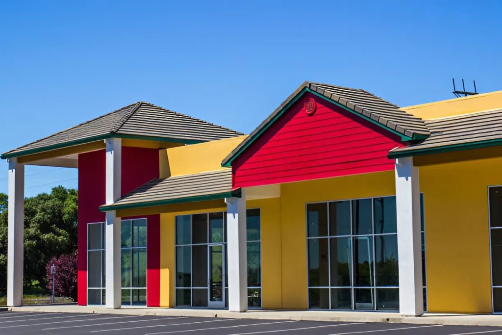 Clean and vibrant retail strip after expert exterior painting in Ashland, OR