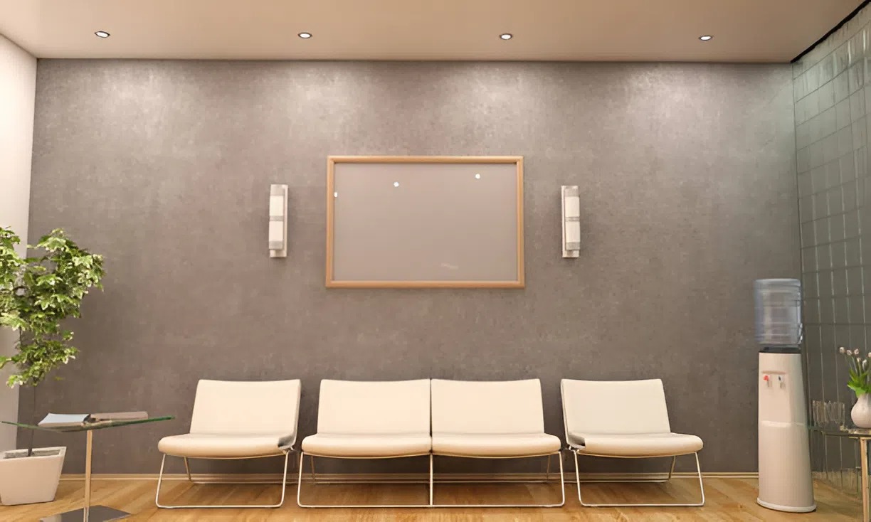 Modern commercial lobby featuring a neutral-toned accent wall painted by an interior painter in Grants Pass, OR