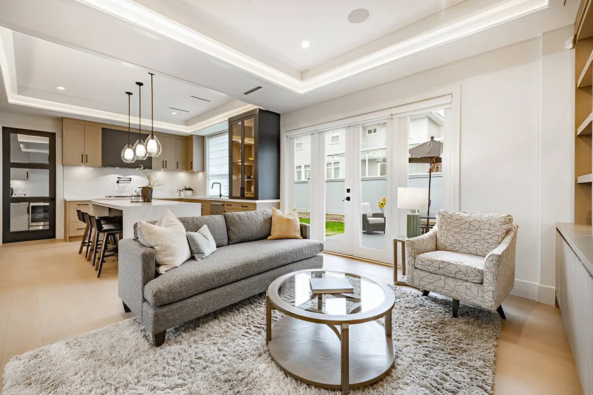 Bright open-plan living space with cohesive neutral interior paint colors by an interior painter in Grants Pass, OR