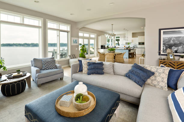 Living room with soft neutral wall paint and large window trims by a house painter in Gold Hill, OR
