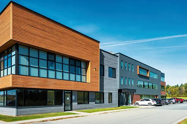 Modern commercial office building with durable exterior siding and UV-resistant paint by a painting company in Ashland, OR