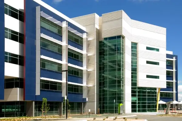 Building exterior with fresh blue and white finishes by an exterior painter in Central Point, OR.